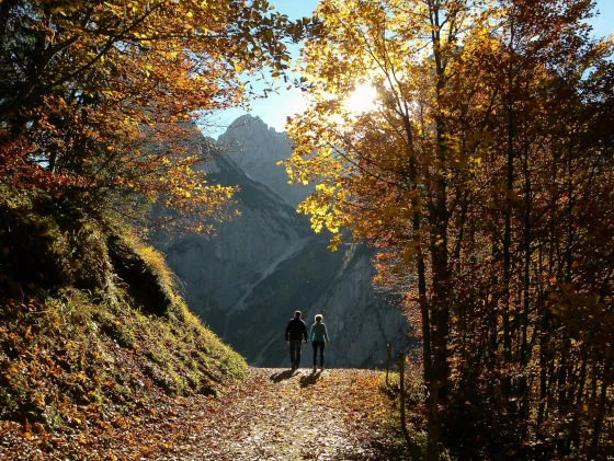 Travellers hiking through the mountain landscapes of Greece